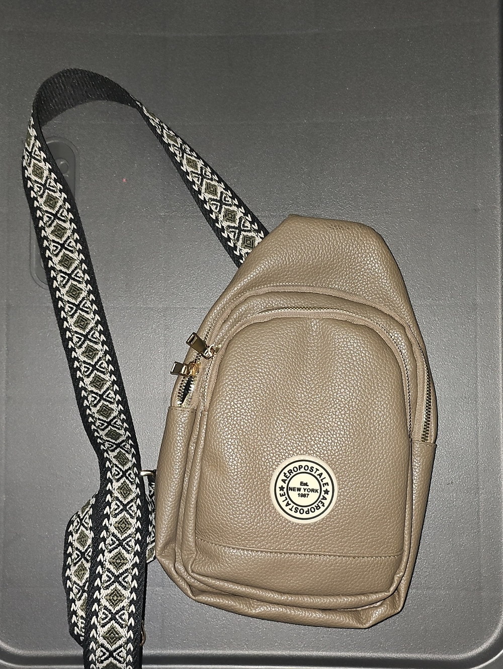 Aeropostale Taupe Pebbled Sling Bag with Patterned Strap